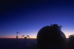 AastinoLowLight - The Aastino science shelter in low backlight.