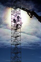 AmericanMastAssemblyBacklit4 - Irridescent clouds while working on the mast.