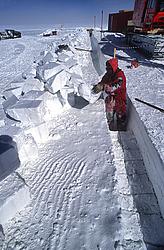 CableWay7 - Digging a trench in the packed snow for power and communicatino cables.