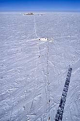 ConcordiaFromMastSummit - The high antarctic plateau of Dome C, the atmospheric science container and Concordia station as seen from a 35m high mast.
