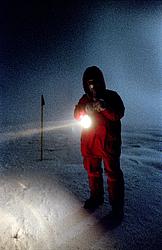 EmanueleCollectingSamples0 - Night sampling in a windstorm. Up on the high antarctic plateau the wind is rare and not very fast, but enough to drop the visibility to a few meters and the windchill to a terrifying -110°C.
[ Click to go to the page where that image comes from ]