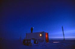 LidarNight2 - Lidar beam visible on the roof of the atmospheric science container.