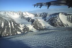 MountainsGlacier1 - Mountains and glaciers while flying over the Trans-Antarctic range.