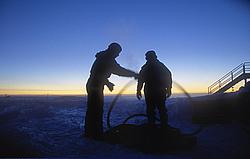 MovingCablesDark - Working outside during the antarctic winter night.