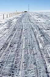 Tracks - Machine tracks on snow.