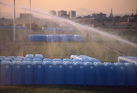 [CessiPapa.jpg]
Some of the thousands of toilets installed all around our research center for the Pope (august 2000). I'm sure they are multiplying all by themselves, see, they are spraying water on them to make them grow !