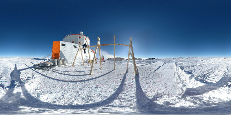 [PanoParking_.jpg]This image, from my Concordia panorama page, is a full 360x180° panorama assembled from 9 fisheye images. It's a spherical projection with a complete field of view, meaning you can see the top and bottom as well. Let's see what we can do with it...