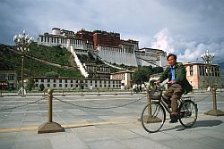 Potala - Chinese biker before the Potala, Tibet, 2000
[ Click to download the free wallpaper version of this image ]