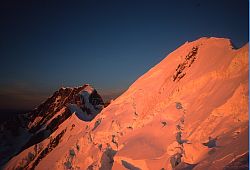 TasmanCookSunrise - Sunrise on Mt Tasman, with Mt Cook in the background, New Zealand 1994