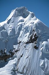 ToclaFace1 - South face of Toclaraju (with climber visible as very small dot near the summit), Peru 1996
[ Click to go to the page where that image comes from ]