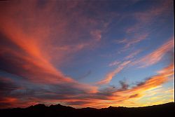 DeathValleySunsetClouds - Sunset clouds over Death Valley. Zion, Utah, 2003
[ Click to download the free wallpaper version of this image ]