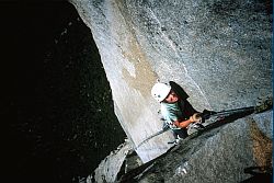 SalatheAfterSewers - Jenny reaching a sloping ledge after the Sewers pitch. Salathé Wall, El Capitan, Yosemite, California, 2003
[ Click to go to the page where that image comes from ]