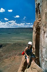 CastletonSitting - Ledge on the North Chimney, Castleton tower, Moab, Utah