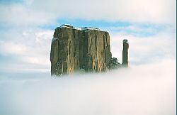 CloudPiercing - Rock towers piercing the clouds, Monument Valley, Arizona
[ Click to download the free wallpaper version of this image ]