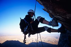 IntiWatanaRappel - Jenny rappelling off the roof of Inti Watana (5.10) Red Rocks, Nevada, 2003
[ Click to download the free wallpaper version of this image ]