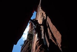 ZionRoofChimney - Looking to pull out of the overhang. Zion, Utah, 2003
[ Click to download the free wallpaper version of this image ]