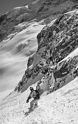 20060406_0011054_SteepSnowboardPanoBW - Snowboarding a steep couloir, La Meije, Oisans.