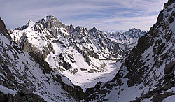 20060515_EcrinFromBrechePano - Peak Coolidge shadowing the Ecrins, above the Glacier Noir, Oisans.
[ Click to go to the page where that image comes from ]