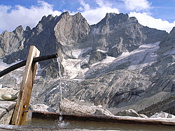 20060810-1754-GrandeRuineFountain2 - Wooden fountain below La Grande Ruine, Oisans.