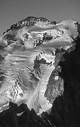 EcrinsCloseVPano-BW - Climbers going up the normal route of Les Ecrins in early morning, Oisans.