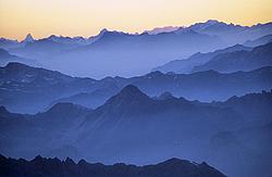 MultipleSummitsMorning0 - Multiple summits ridges seen at dusk, Alps.
