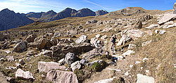 20061030-BikeBouldersPano_ - Mountain biking across a boulder field, southern Alps.