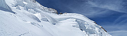 20070507_EcrinsSidePano_ - Shortly before the final traverse under the main summit. Plenty of people under the Lory breach (pass).
[ Click to go to the page where that image comes from ]