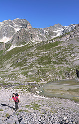 20070715-094313_LacVachesVPano_ - Hiking up towards the base of the Vanoise Needle, above Cow lake.
[ Click to go to the page where that image comes from ]
