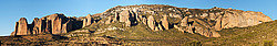 20071031_170543_RiglosAllPano_ - A complete (?) view of the various rock structures forming the Mallos de Riglos.
[ Click to go to the page where that image comes from ]