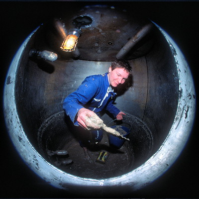 [CleaningWaterSystem2FH.jpg]
An example showing the use of a fisheye lens to take a picture of a round object, in this case a duct opening (okay, this is not perfectly framed, but you get the point). Claire inside a water recycling tanks, cleaning the mud from the bottom. See and compare the similar straightened image farther down.