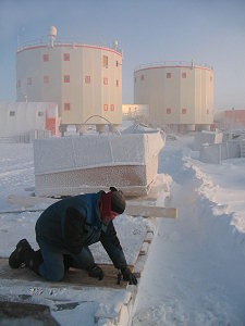 Jean repairing the trailer below the towers of Concordia