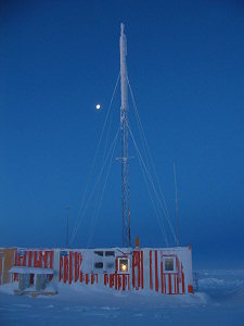 Snowned up radio antenna at the summer camp, during the winter