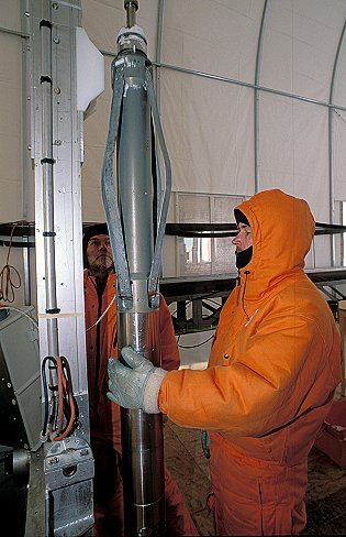 [Drilling.jpg]
Prepping the ice drill onto the wire that will bring it down the hole.