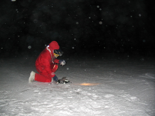 [20050417_17_SnowSample.jpg]
Emanuele taking a snow sample at night, a km away from the station.