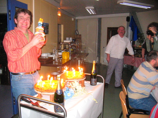 [20050820_039_Candles.jpg]
Michel holding the infamous singing cake, about to blow his candles on an almond cake.