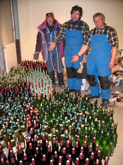 [FrozenWine.jpg]
Stéphane, Jeff and Jean look dejected at the hundreds of frozen wine bottles.