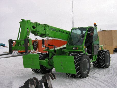 [Merlo.jpg]
That's me driving the Merlo crane to give a hand to Antonio as he's disassembling the chains off a snowcat (Photo courtesy of Sergio Tugnoli).