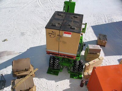 [MerloCrate.jpg]
The Merlo crane bringing a crate of frozen food into the 2nd floor storage room.