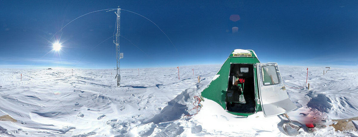 [PanoCR23.jpg]
The CR23 mast and its small shelter where I can hide to try and download the data acquired during the winter. The mast measures the gradient of various atmosphere physics parameters between the ground and about 12 meters. Concordia is just north, below the sun, about a km away.