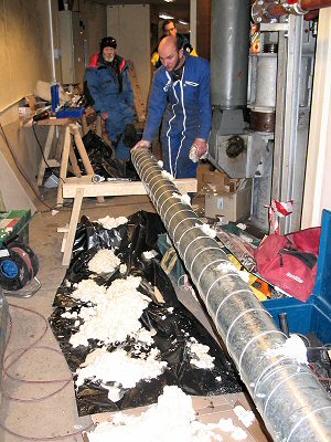 [TubeSealing.jpg]
Sealing air ducts during construction of Concordia.