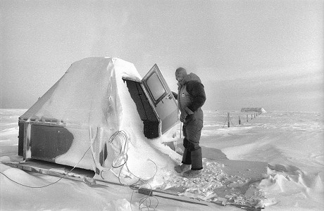 [LittleShelterDoor-BW.jpg]
Opening the snow covered door of the tiny atmospheric science shelter next to the CR23 mast.