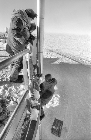 [RappelFixingExhausts-BW.jpg]
Rappelling down the face of the building to fix an ice-encroached exhaust pipe at the exit of the bathroom incinolet burners. Otherwise, we have to go outdoors to 'unload', not a pleasant thought !