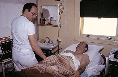 [CGT+Bib.jpg]
Our doctor talking with Charles-Gilles, the nervous patient, the day before the surgery