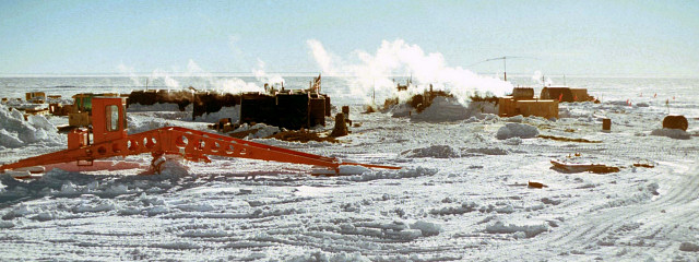 [Dome_Charlie_Slide08_.jpg]
Temporary summer camp erected for the repair mission. The red device in the foreground is used to flatten the snow of the airstrip (image courtesy Richard Sheehan)