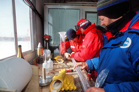 [DrillFluidPackagePrep.jpg]
Adding a plastic bag of drill fluid of a lesser density, so that it breaks apart when the drill reaches the ice. It helps avoiding lockups of the mechanism.