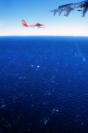 [FlyingAboveAntarcticOcean.jpg]
Flying above the frigid Antarctic Ocean, with a few chunks of floating ice.