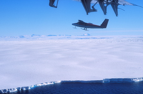 [FlyingAboveIceShelf1.jpg]
Flying above the edge of the ice shelf. This is what breaks into tabular icebergs.