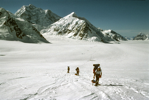 [GlacierMarch.jpg]
Going up on the Kahiltna glacier. Mt Frances in the middle and Hunter in the back.