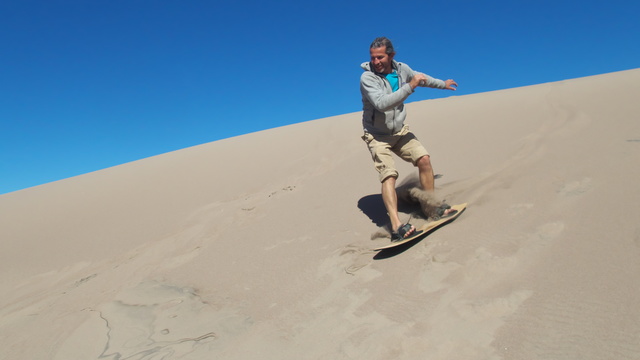 [20190503_084244_SandDunes.jpg]
Sandboarding. Maybe it's that I'm out of practice snowboarding, which I haven't done in 30 years, or it's because I'm barefoot, but I found that frontside turns were just impossible, while backside were doable.