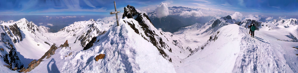 [20070408-BelledoneCrossPano_.jpg]
The cross on the summit of the secondary summit of the highest peak of Belledonne, dubbed 'La croix de Belledonne'. Behind the cross is the Grand Pic, barely 50m higher.